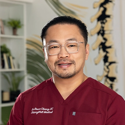 A headshot of Dr. Bruce Chiang, a chiropractor at ChiangWell Medical.
